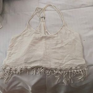 White crop top with dangles.